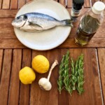 świeża dorada, cytryny, świeży rozmaryn, oliwa