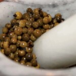 zielony pieprzy w moździerzu