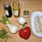 Śledzie z fenkułem kaparami i oliwkami