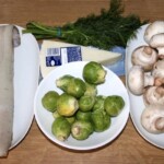 Sandacz pieczony z brukselką pieczarkami i serem składniki