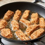 ryba po chińsku w pięciu smakach smaży się na patelni