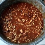 Ośmiornica z makaronem w sosie pomidorowym