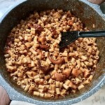 Ośmiornica z makaronem w sosie pomidorowym