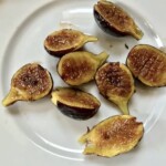 świeże figi przekrojone na połowę i karmelizowane miodem