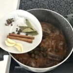 Królik duszony z cynamonem i mandarynkami